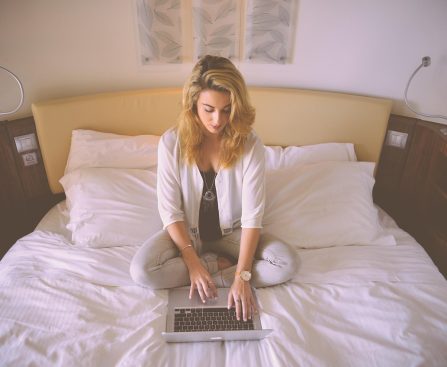 Woman, working, bed — Stay Ahead of Issues with Squatters Rights 30 Days Indiana