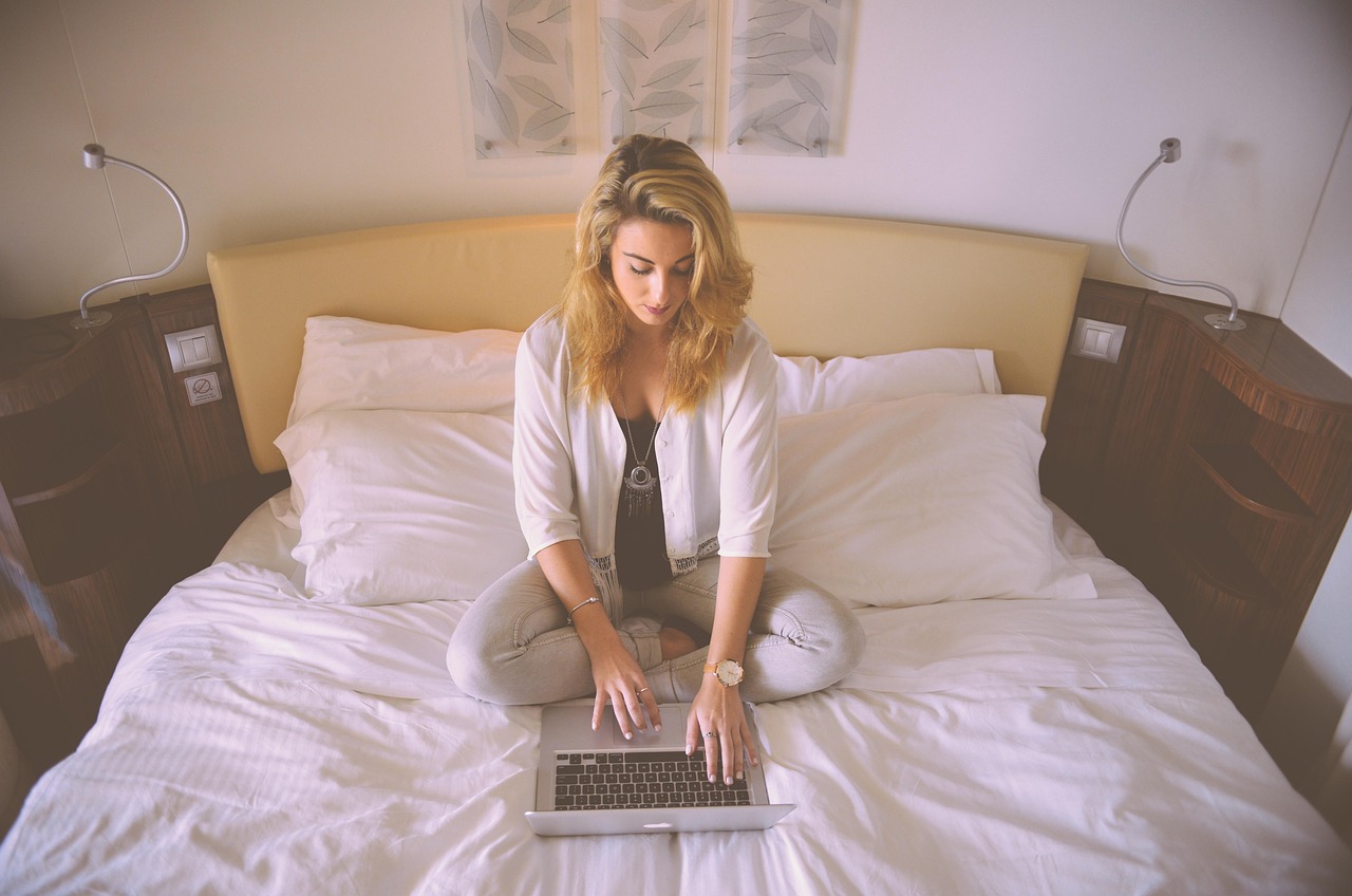 Woman, working, bed — Stay Ahead of Issues with Squatters Rights 30 Days Indiana